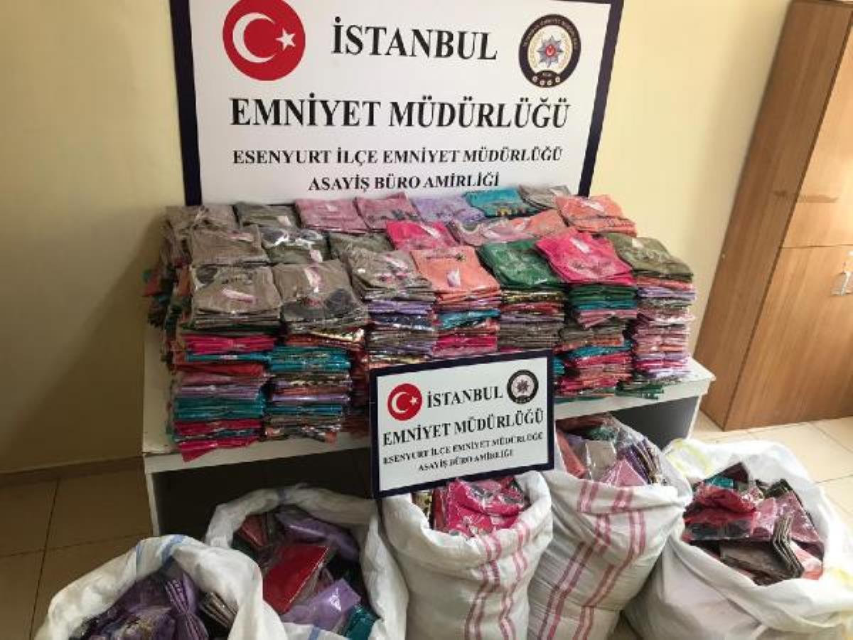 ESENYURT'TA ÇALDIKLARI GİYSİLERİ OTOPARKTA SATARKEN YAKALANDILAR