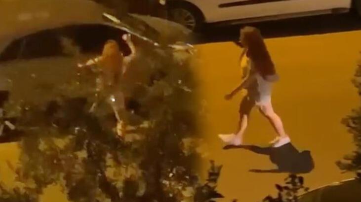 Genç kadın çılgına döndü! Hıncını otomobilden çıkardı