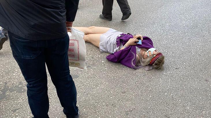 Gören yardıma koştu! Genç kadın önce yola yattı, ardından denize atladı