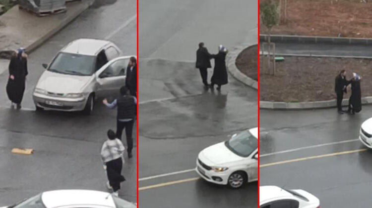 Kadını zorla otomobile bindirmek isteyen kişiye çevredekiler engel oldu!