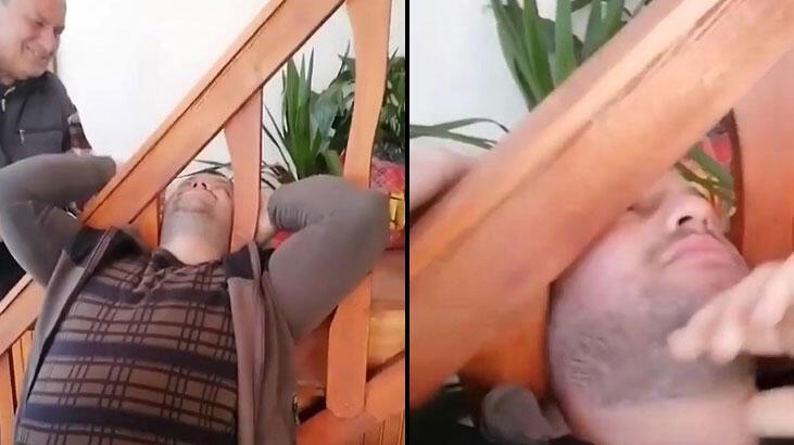 Kafası merdiven korkuluğuna sıkıştı