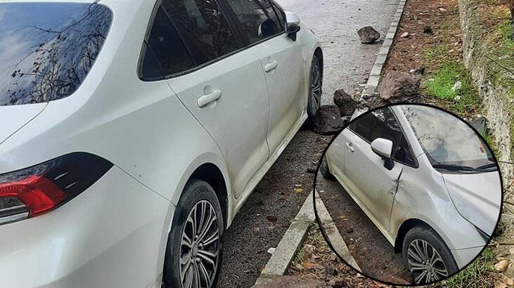 Kaleden kopan kaya parçaları otomobile çarptı