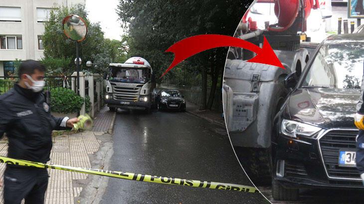 Kontrol için indi, beton mikseri ve otomobilin arasında sıkıştı