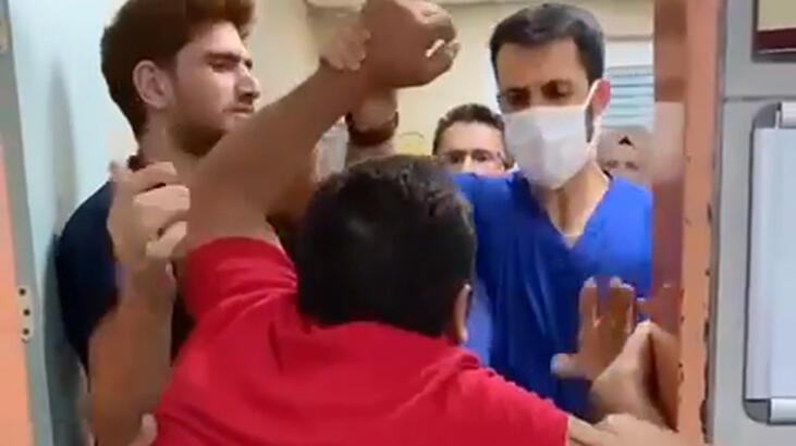 'Maske' uyarısında bulunan doktora 'Çocuğuma bakacaksın' diyerek saldırdı