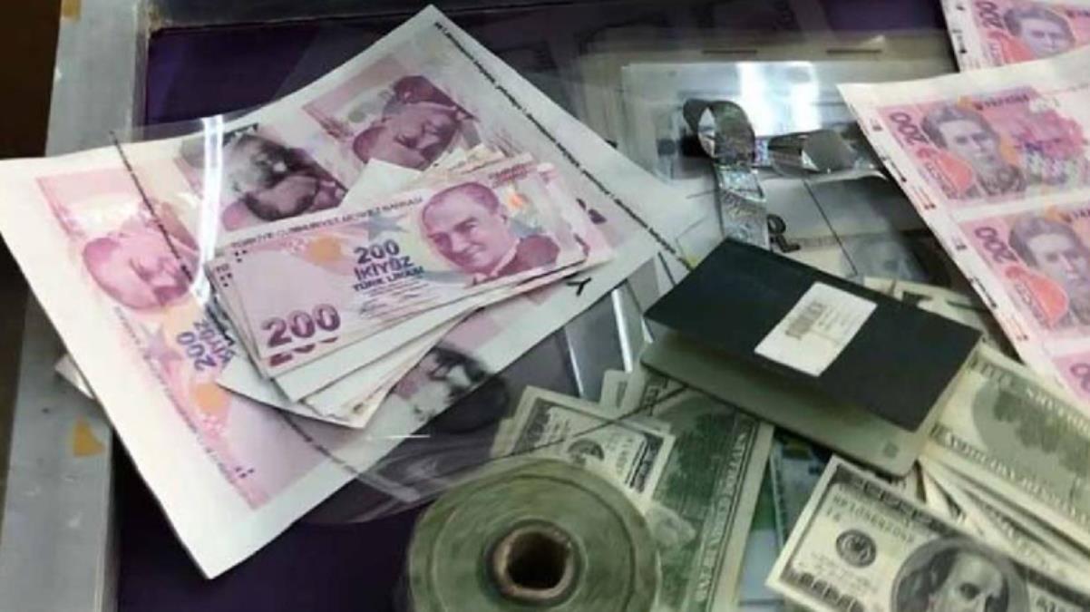 Mum kullanarak sahte paraları gerçeğe yakın hale getirmişler