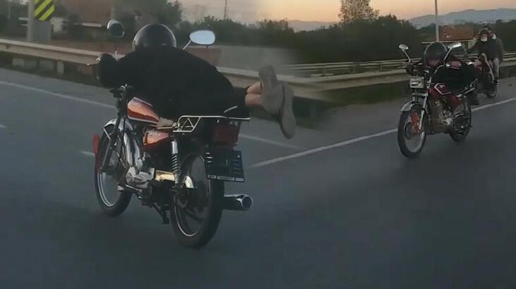 Plakasını söktüğü motosikleti yüzüstü yatarak kullandı