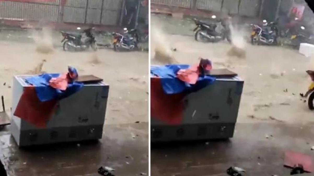 Şiddetli yağış Çin'de hayatı durma noktasına getirdi! Dolu taneleri yere mermi gibi düştü