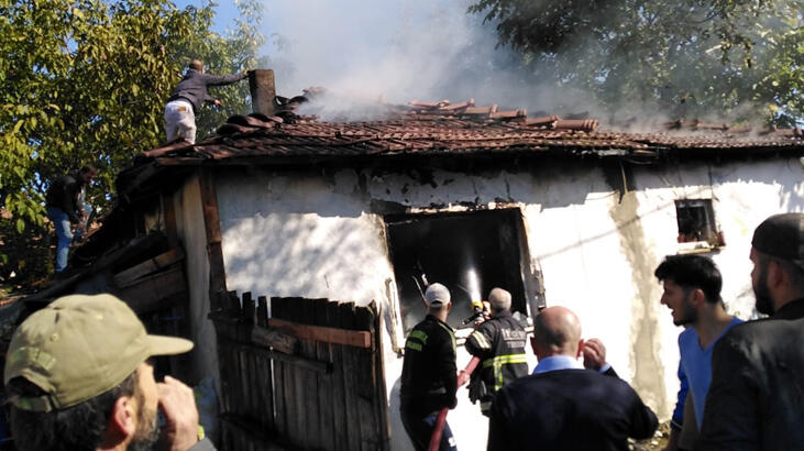 Soba kurarken evini yaktı!