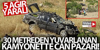 30 metreden yuvarlanan kamyonette can pazarı yaşandı!