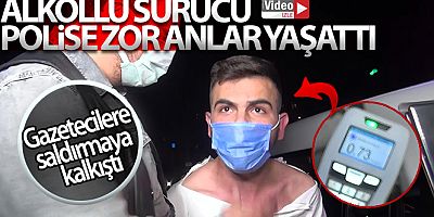 Alkollü sürücü polise zor anlar yaşatırken, gazetecilere saldırmaya kalkıştı