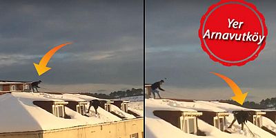 Arnavutköy'de çatıda korkutan kar temizliği