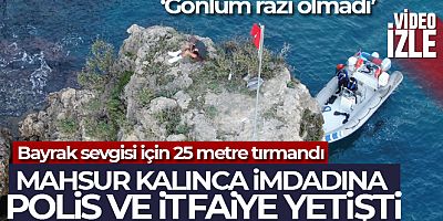 Bayrak sevgisiyle çıktığı 25 metrelik kayalıklarda mahsur kaldı