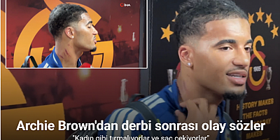 Boynundaki yarayı gösteren Archie Brown: 