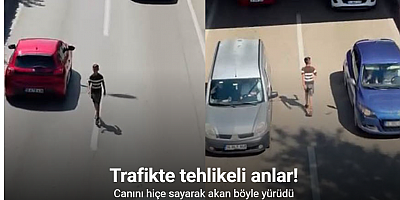 Canını hiçe sayarak akan trafikte böyle yürüdü