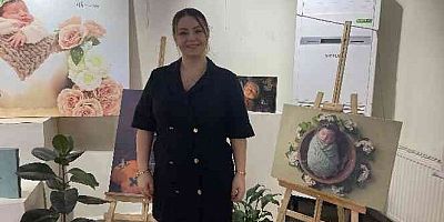 Çektiği bebeklerin fotoğraflarını sergiledi