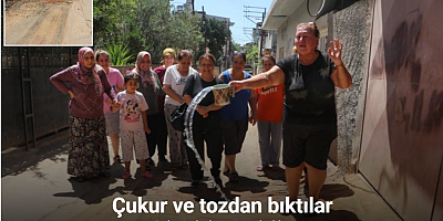 Çukur ve tozdan bıktılar, sokağa halı serip suladılar