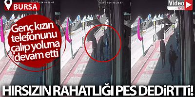 Genç kızın telefonunu çaldı, hiç birşey olmamış gibi yoluna devam etti
