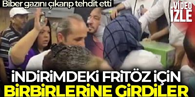 İndirimdeki fritöz için birbirlerine girdiler