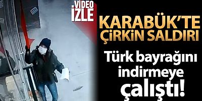 İş yerindeki Türk bayrağını indirmeye çalışan kadın kameraya yakalandı