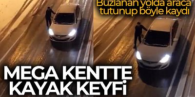 İstanbul'da 'kayak keyfi'...Buzlanan yolda araca tutunup böyle kaydı