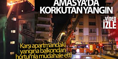 Karşı apartmandaki yangına balkondan hortumla müdahale etti