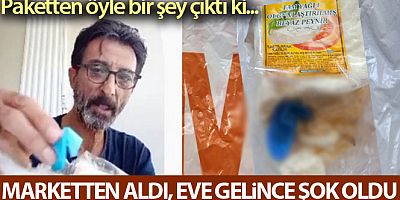 Marketten aldığı peynirin içinden eldiven çıktı