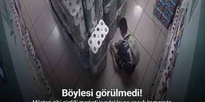Müşteri gibi girdiği marketi kundaklayan çocuk kamerada
