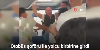 Otobüs şoförü ile yolcu birbirine girdi...O anlar kamerada