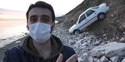 Otomobil kumsala uçtu, vatandaşlar sürücüyü boşverip hatıra fotoğrafı çektirdi