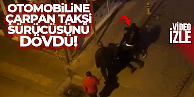 Otomobiline çarpan taksi sürücüsünü dövdü