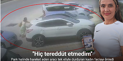 Park halinde hareket eden aracı tek eliyle durduran kadın faciayı önledi
