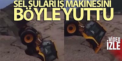 Sel suları iş makinesini böyle yuttu