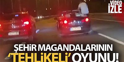 Seyir halindeki araçlardan dışarı çıkan magandalar kamerada