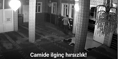 Sultangazi’de camide beğendiği ayakkabıyı montunun içine saklayarak çalan hırsız kamerada