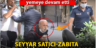 Taksim'de seyyar satıcı-zabıta arbedesini polis sonlandırdı; o aldırmadan dürümünü yemeye devam etti