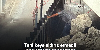 Tehlikeye aldırış etmedi: Çöken alt geçide girip testereyle demir kesti