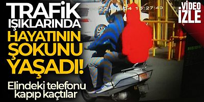 Trafik ışıklarında hayatının şokunu yaşadı, elindeki telefonu kapıp kaçtılar