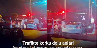 Trafikte yaşanan tekmeli, yumruklu kavgayı ayırmaya çalışan kadının zor anları kamerada
