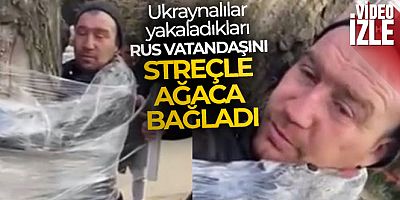 Ukraynalılar yakaladıkları Rus vatandaşını ağaca bağladı