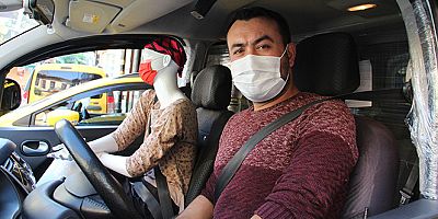 Uyanık taksiciden cansız mankenli önlem