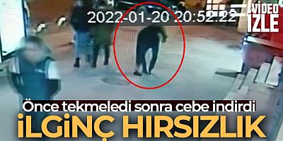 Yere düşürülen para dolu poşeti ayağıyla iterek el çabukluğuyla çaldı