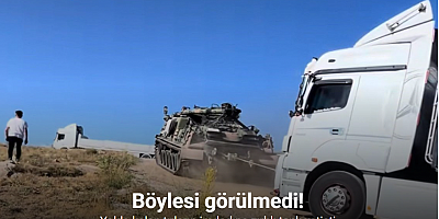 Yolda kalan tırların imdadına zırhlı tank yetişti