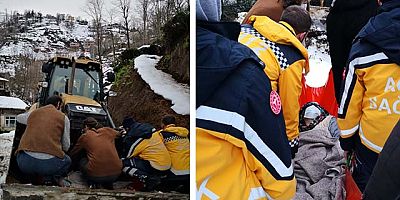 Yolu karla kaplı köyde mahsur kalan hasta, kepçeyle ambulansa taşındı