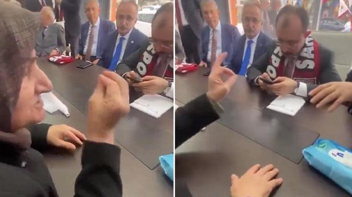 Yaşlı kadının derdini anlatmak istediği Bakan Muş cep telefonundan başını kaldırmadı